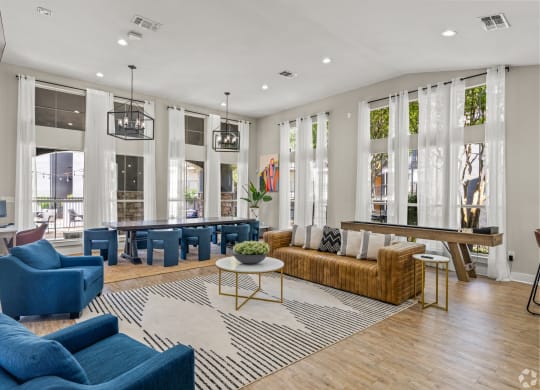 a living room with couches and chairs and a table at District 2308, Texas ?