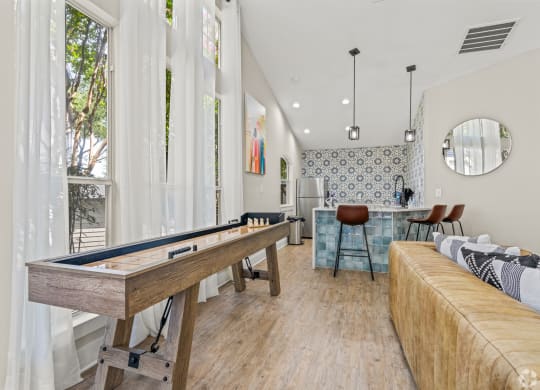 a game room with a pool table and a bar at District 2308, Texas ?