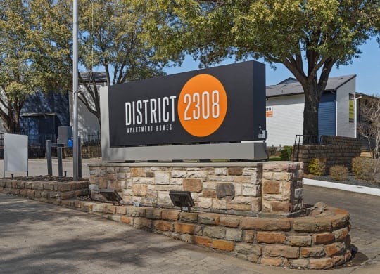 the sign for district 2400 in front of a building at District 2308, Arlington, TX ?
