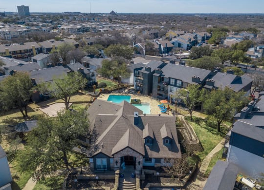 a aerial view of a house with a swimming pool at District 2308, Arlington, 76011 ?