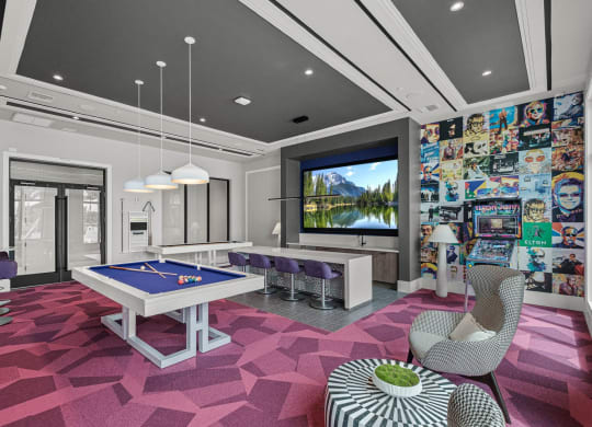 a game room with a pool table and a tv at Altis Grand Kendall, Florida, 33186