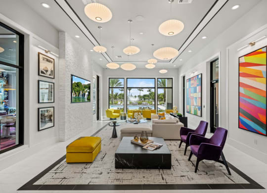 a rendering of a lobby with yellow and purple chairs and tables at Altis Grand Kendall, Florida, 33186