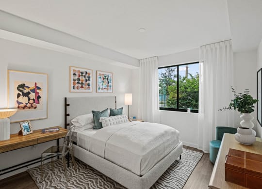 a bedroom with a bed and a window at Altis Grand Kendall, Miami, FL