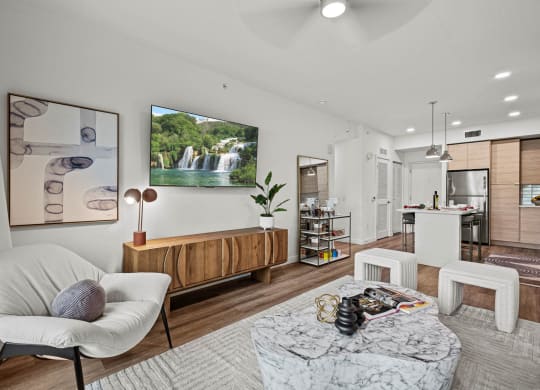 a living room with a couch and a table at Altis Grand Kendall, Miami, FL