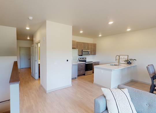 View of Space, Hallway, 1/2 Bath, Kitchen and Stairs