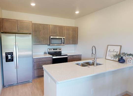 Beautiful Cabinets, Quartz Countertops, Stainless Steel Appliances