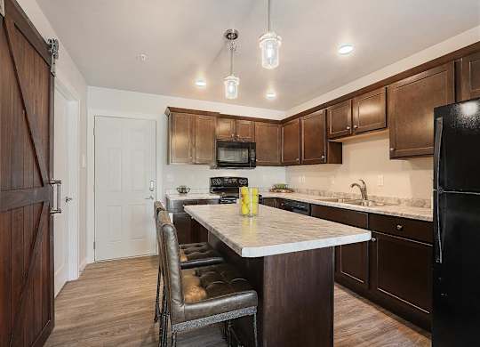 Kitchen with Island and Chairs