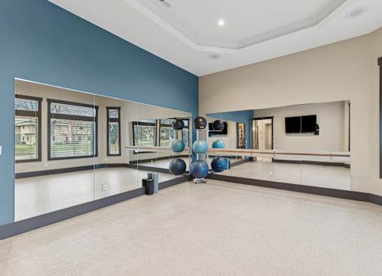 A room with a blue wall and a white floor.