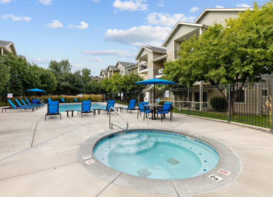 the preserve at ballantyne commons resort swimming pool with blue chairs and