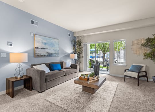 an open living room with a couch and a coffee table