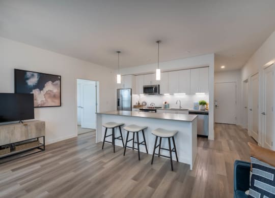 Corsair Apartments Kitchen with Barstool and Island