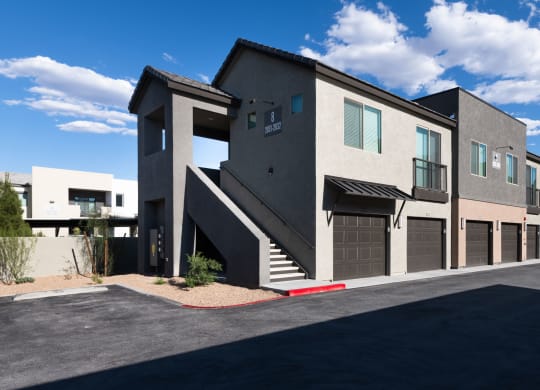 a view of a building with a street in front of it