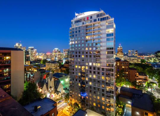 a view of the city from a high rise building at night