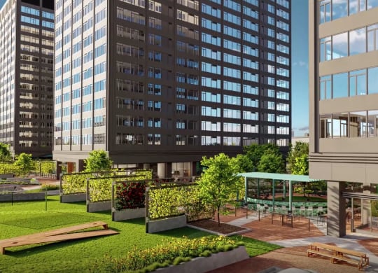 a rendering of a courtyard in front of a tall building