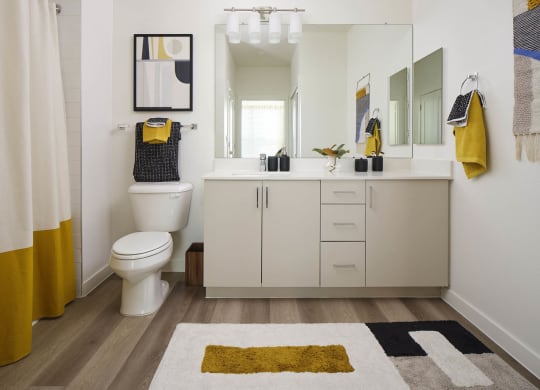 a bathroom with a toilet and a sink