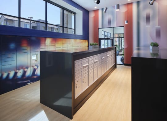 a long counter in a lobby of a building with windows