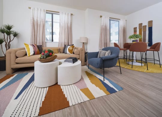 a living room with a couch and a table