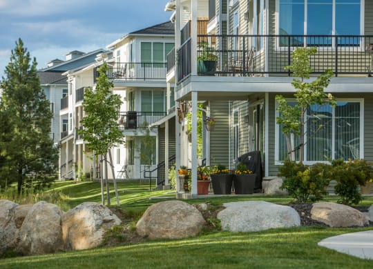 River House Apartments Building Exterior and Green Grass