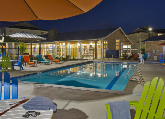 River House Apartments Pool Area and lounge chairs