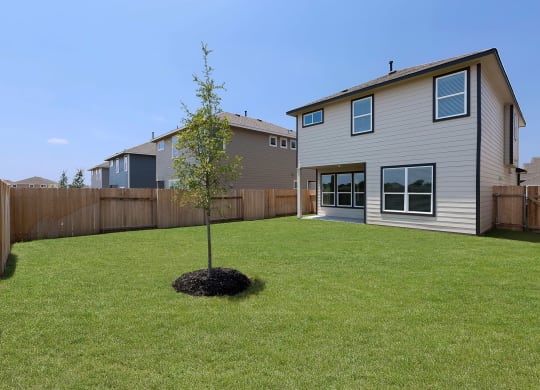 Rivers Edge Apartments Private, Fenced Backyards with Grass