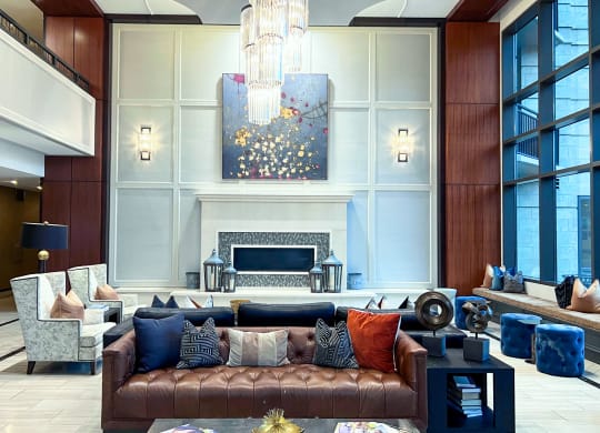 a large living room with a couch and a fireplace