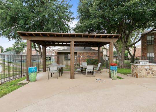 our apartments offer a clubhouse with a picnic table and grill