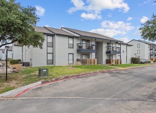 exterior view at the whispering winds apartments in pearland, tx