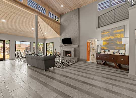 A modern living room with a fireplace and a television.