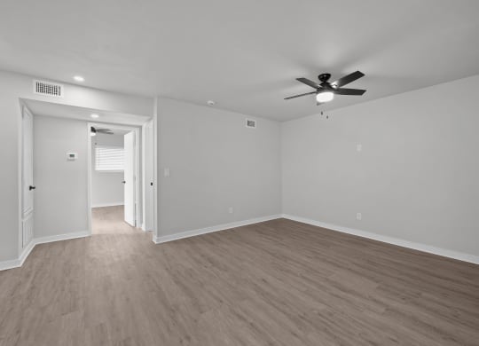 Unit image of renovated bedroom with vinyl flooring at Sunset Heights, San Antonio, TX