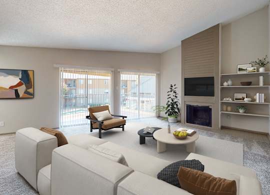 A living room with a white couch and a television.