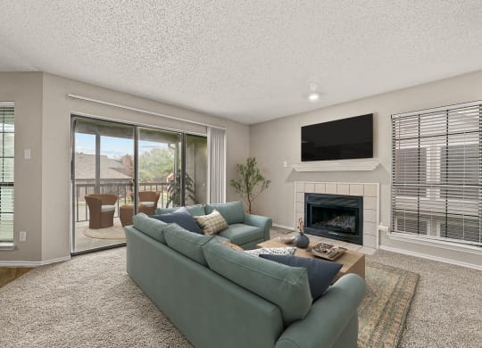 a living room with a couch and a fireplace