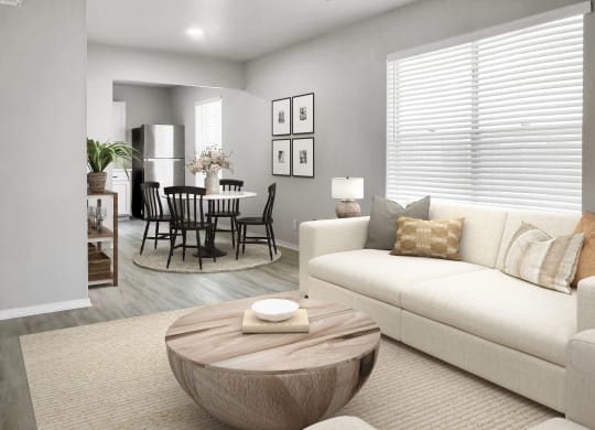 a living room with a couch and a coffee table in front of a dining room table  at Sunset Heights, Texas