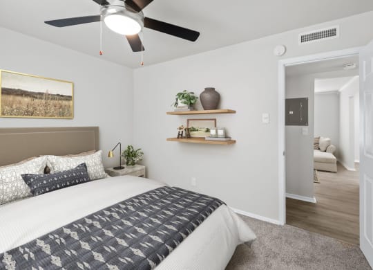 our apartments offer a bedroom with a king sized bed  at Sunset Heights, San Antonio, TX, 78209