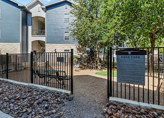 the preserve at ballantyne commons park entrance with gate and bench at Remington Ranch, San Antonio