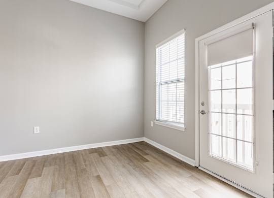 A room with a door and a window.