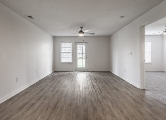 living room with a ceiling fan at Latitudes Apartments, Indianapolis, IN, 46237