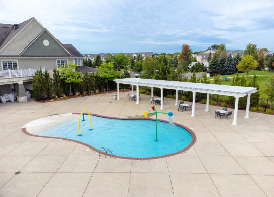 our apartments showcase a swimming poolat The Harbours Apartments, Clinton Twp, 48038