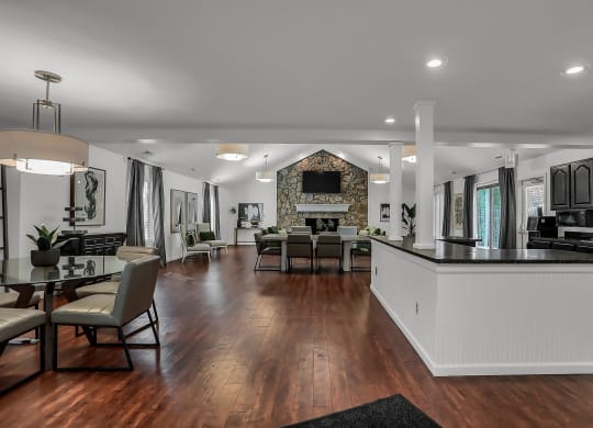 a large living room with a kitchen and a dining room at Polo Run Apartments, Greenwood, IN, 46142