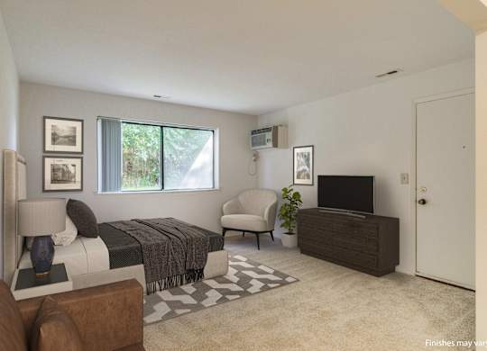 A living room with a brown couch, a bed, a chair, a television, and a potted plant.