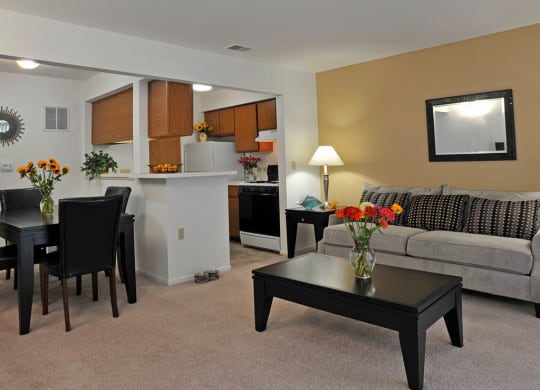 Living Room, Kitchen and Dining Area at The Harbours Apartments, Clinton Twp, 48038
