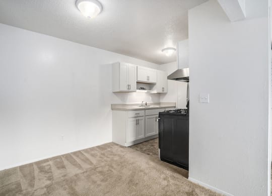 dining area leading into a kitchen at Apple Ridge Apartments, Michigan, 49534