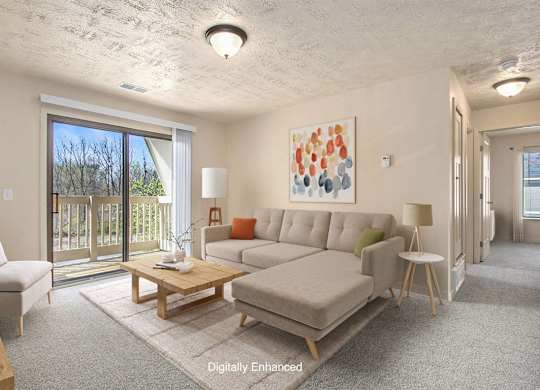 A living room with a couch, a coffee table, and a painting on the wall