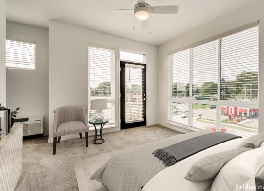 a bedroom with a bed and a chair  at Uptown Square Apartments, Michigan