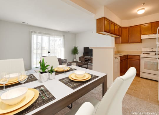 Aster Layout Dining Area with Kitchen View at The Harbours Apartments, 48038
