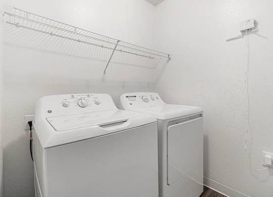 A laundry room with a washer and dryer at Autumn Lakes Apartments and Townhomes, Mishawaka, 46544
