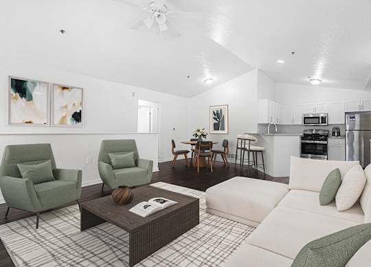 A living room and a kitchen with stainless steel appliances at Autumn Lakes Apartments and Townhomes, Mishawaka, 46544