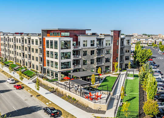 an aerial view of a row of apartment buildings on a city street at Avant & Avant II, Carmel, IN, 46032