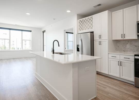 a large white kitchen with white cabinets and a white counter top at Avant & Avant II, Carmel, IN, 46032