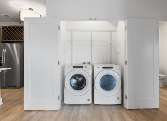 a washer and dryer in a white closet in Carmel, IN, 46032
