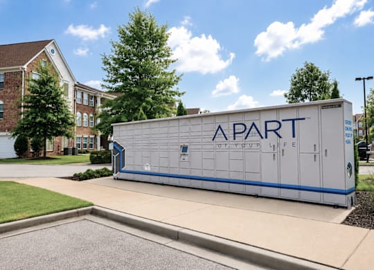 A white and blue trailer with the words Apartment Life on it.